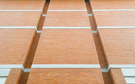 red brick wall texture grunge background with vignetted corners of interiorの写真素材