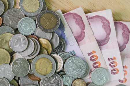 background of Thailand banknotes and coinsの写真素材