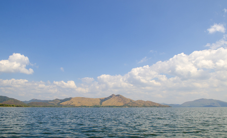 Lake, mountains and clouds blue sky, Thailandの写真素材