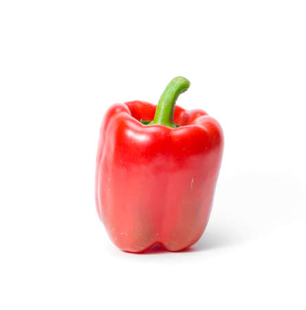 Bright red pepper isolated on whiteの写真素材
