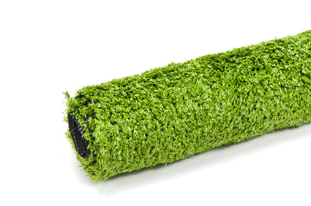Green artificial turf rolledの写真素材