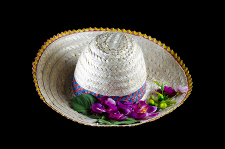 beach hat and flower isolated on black with clipping pathの写真素材