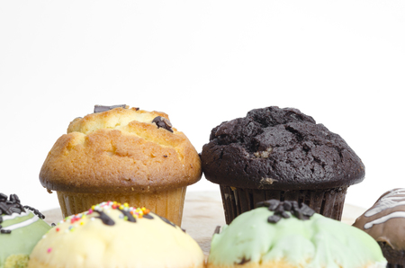 Chocolate muffin cake isolated on whiteの写真素材