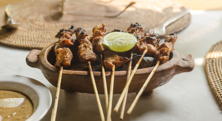 fresh vegetables nuts and fish with rice popular across indonesia and malyasia