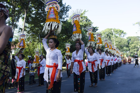 DENPASAR, BALI, INDONESIA - JUNE 18: Unidentified dancer of Balinese in colorful dresses variety on...