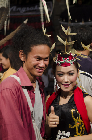 DENPASAR, BALI, INDONESIA - JUNE 14: Unidentified dancer from the indigenous Borneo people performs a traditional Borneo dance at Bali Art Festival on June 14, 2014 in Denpasar, Indonesiaのeditorial素材
