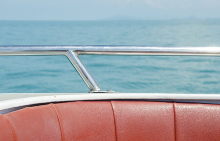 seascape boat on the high seas clear sunny dayの写真素材