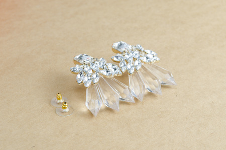 crystal earrings on vintage backgroundの写真素材