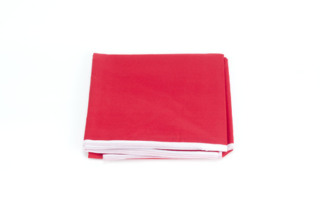 Pile of different fabrics isolated on whiteの写真素材