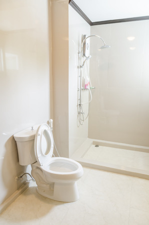 White toilet bowl in a bathroomのeditorial素材