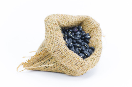 Beans in sack isolated on whiteの写真素材