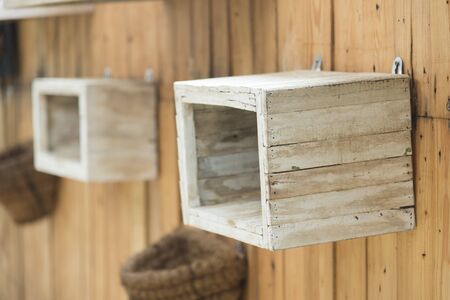 Wooden wall with wooden boxの写真素材