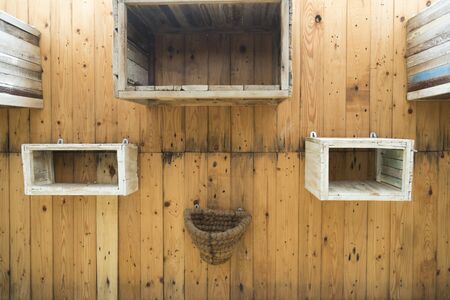 Wooden wall with wooden boxの写真素材