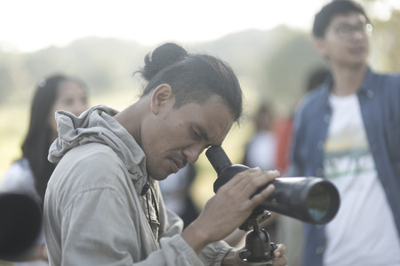 Nakhonratchasima, THAILAND - NOVEMBER 15 : Bird watchers and nature lovers Tourists enjoy watching the Bird on November 15, 2015 at Khao Yai National Park in Nakhonratchasima, Thailandのeditorial素材