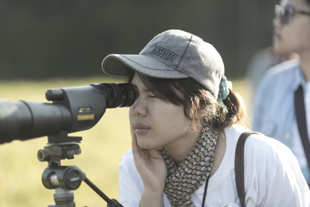 Nakhonratchasima, THAILAND - NOVEMBER 15 : Bird watchers and nature lovers Tourists enjoy watching the Bird on November 15, 2015 at Khao Yai National Park in Nakhonratchasima, Thailandのeditorial素材