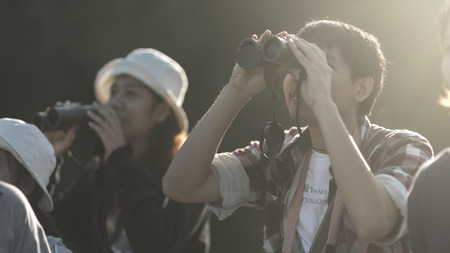 Nakhonratchasima, THAILAND - NOVEMBER 15 : Bird watchers and nature lovers Tourists enjoy watching the Bird on November 15, 2015 at Khao Yai National Park in Nakhonratchasima, Thailandのeditorial素材