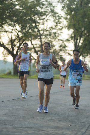 Nakhonnayok, THAILAND-November 1 : unidentified runner are participates in Nakhonnayok 2015 Marathon relay run fun forward on November 1, 2015 in Nakhonnayok, Thailandのeditorial素材