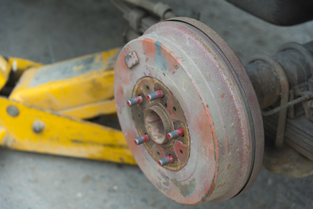 Brakes on a car with removed wheelの写真素材