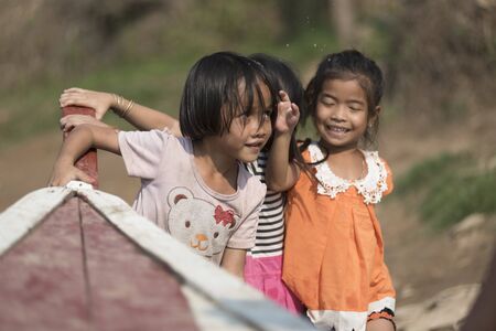 mandalay, Myanmar - Circa September 2015 - a burmar teenager kids having fun with friends ..のeditorial素材