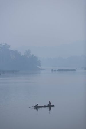 Kanchanaburi, Thailand, January 3, 2016 :Fishermen along the banks of the Meklong river, Thailand.のeditorial素材