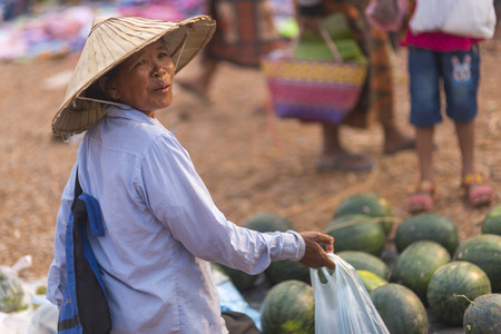 LUANG PRABANG, LAOS - December 12, 1015: Luang Prabang Morning Market on December 12, 1015 in luang prabang Laos. The Morning Market is a popular souvenir shopping site for tourists.のeditorial素材