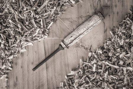 Desk of a carpenter tools. Studio shot on a wooden background.の写真素材