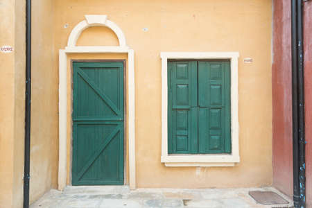 Old stone wall with ivy as backgroundの写真素材