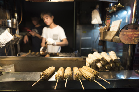 Taipei, Taiwan - November 12th 2016 - Locals and tourists enjoying the street market of Taipei downtown in Taiwan, Asiaのeditorial素材