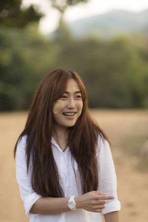 Sangkla Buri, Kanchanaburi, Thailand - November 19, 2016 : Little Mon people welcome tourists near the wooden bridge or Mon Bridgeのeditorial素材