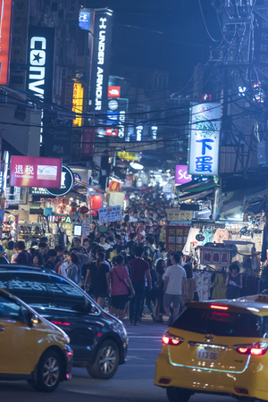 Taipei, Taiwan - November 12th 2016 - Locals and tourists enjoying the street market of Taipei downtown in Taiwan, Asiaのeditorial素材
