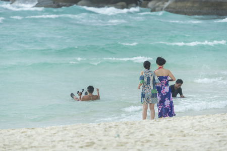 Phuket, THAILAND - JANUARY 4, 2017. A tourist wearing a bikini swim in the sea in Phuket.のeditorial素材