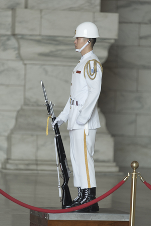 Taipei,Taiwan - November 22, 2016: Soldiers stand guard at the Chiang-kai Shek Memorial Hall in Taipei, Taiwan.のeditorial素材