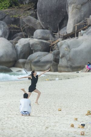 Phuket, THAILAND - JANUARY 9, 2017. The activities of tourists on the beach in the sea in Phuket.のeditorial素材