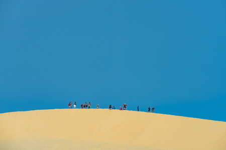 MUI NE - VIETNAM, JANUARY 14, 2017 : Tourists enjoy on the desert by jeep car in Mui ne, January 14, 2017のeditorial素材