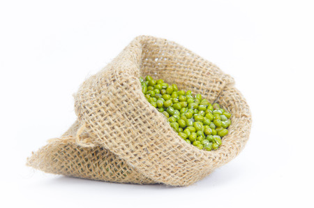 Beans in sack isolated on whiteの写真素材