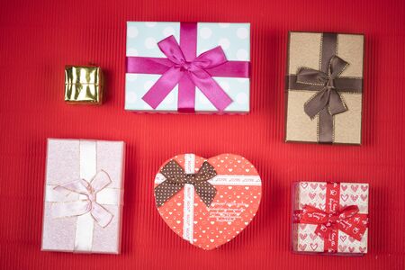 Valentines gift box on red background/ Valentines day background
