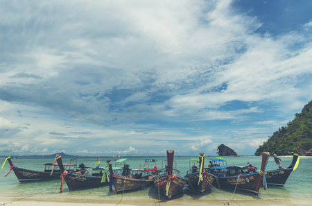 KRABI,THAILAND - April 14, 2017: Tourists enjoying the beautiful miracle beach & crystal clear water at Koh Kai, Koh Tub & Koh Mor, Krabi, Thaiandのeditorial素材