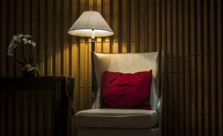 Sofas in luxury hotels with night lightsの写真素材