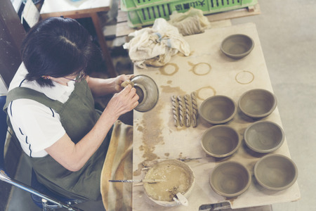 FUKUOKA, JAPAN - OCTOBER 2, 2017: The artist is making bowls with ceramic clay in Fukuoka, Kyushu, Japanのeditorial素材