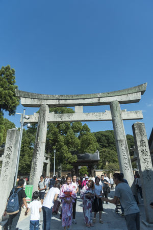 FUKUOKA,JAPAN-October 6, 2017: Many Tourists are walking pass the Torii gate of Dazaifu tenmangu shrine ,The most famous and ancient in Fukuoka, Japanのeditorial素材