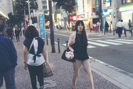 FUKUOKA, JAPAN-October 6, 2017: Many Tourists are walking pass the Torii gate of Dazaifu tenmangu shrine in the temple ,The most famous and ancient in Fukuoka, Japanのeditorial素材