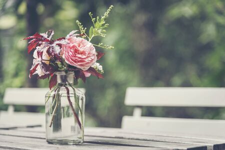 Beautiful flowers in a tableware vase.の写真素材