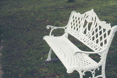 white chair in gardenの写真素材