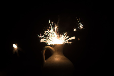 Christmas holding bengal burning sparkler lightの写真素材