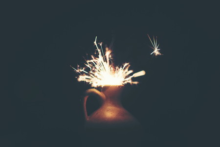 Sparkler with background Christmas light bokehの写真素材