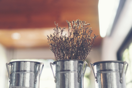 vintage flower in coffee cafe shop, vintage filter imageの写真素材