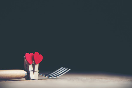 Valentines day red heart on old wood. Holidays background. Card for love.の写真素材