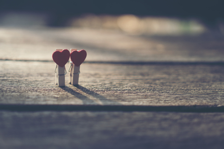 Valentines day red heart on old wood. Holidays card with copy space.の写真素材