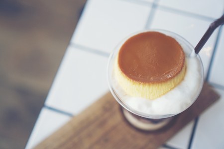 Pudding on top of foamy drink