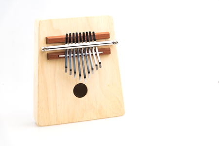 Wooden ethnic African instrument Kalimba isolated on white backgroundの写真素材